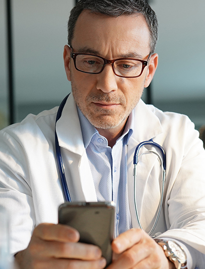 Image of a physician securely texting a patient